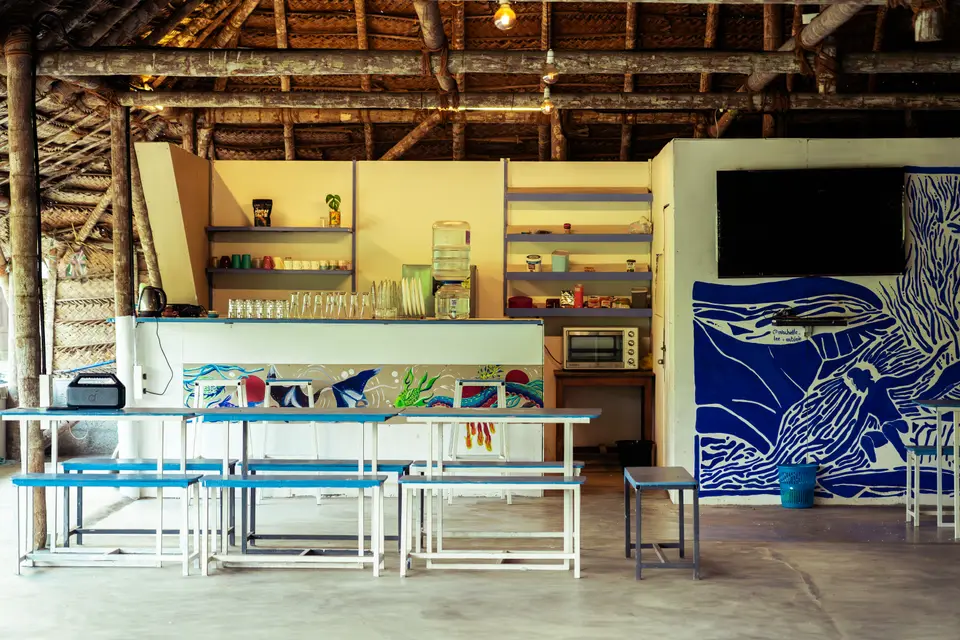 The kitchen and the mural behind it